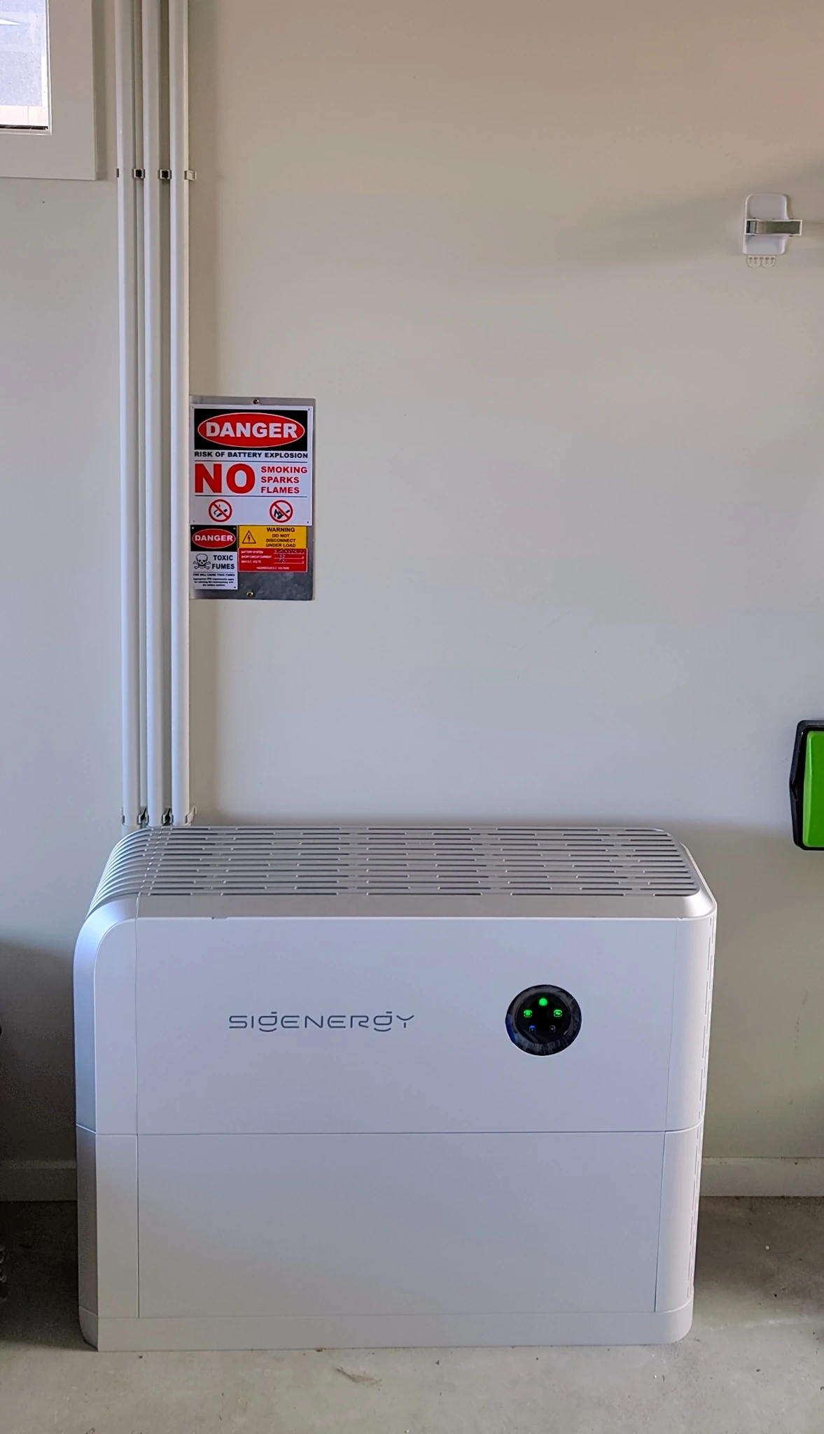 Installed Sigenergy inverter and battery with wall-mounted cabling